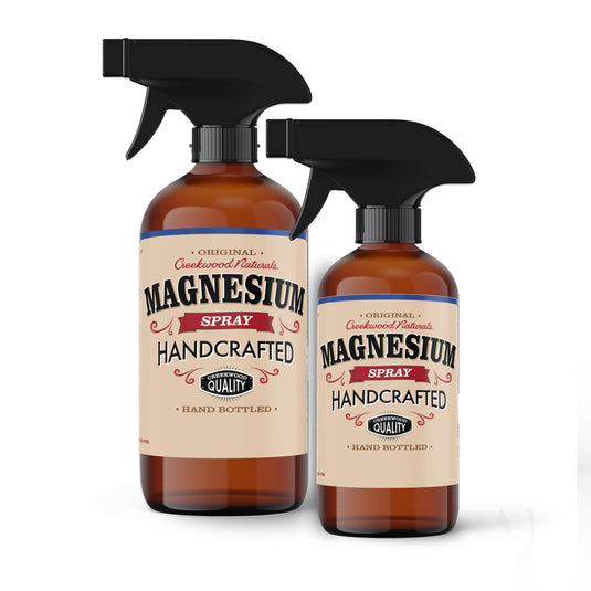 hand bottled magnesium oil chloride spray in amber glass bottles