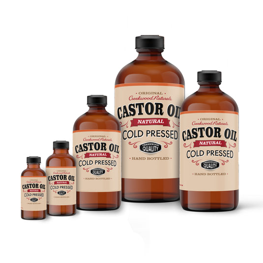 Cold Pressed Natural Castor Plant Oil In Amber Glass Bottles